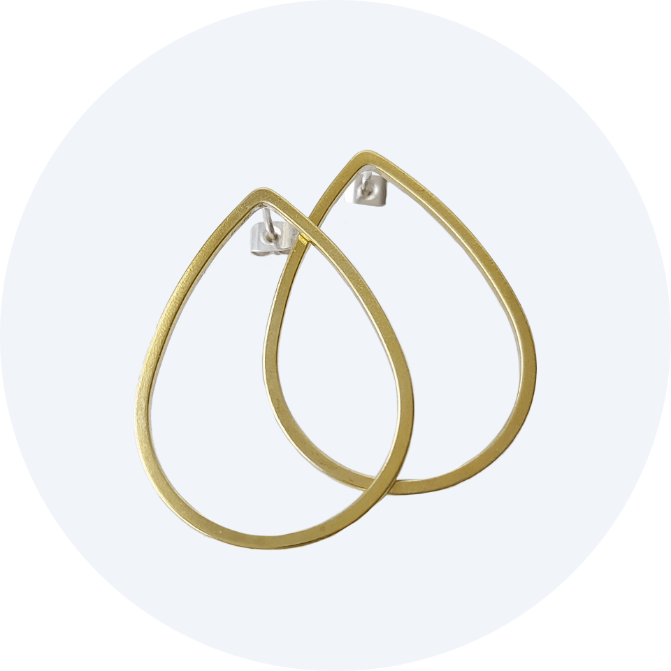 Brass teardrop shaped earrings by Brass + Bold