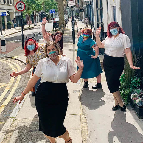 Fit models testing new plus size clothing styles in the sunshine