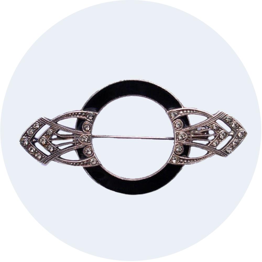 Art Deco brooch made from silver, black enamel and dimantes