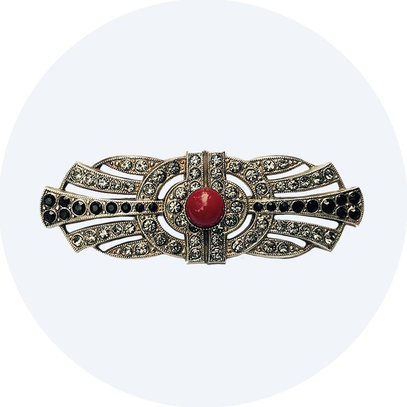 Art Deco brooch with red stone centre and clear and black diamante stone detailing