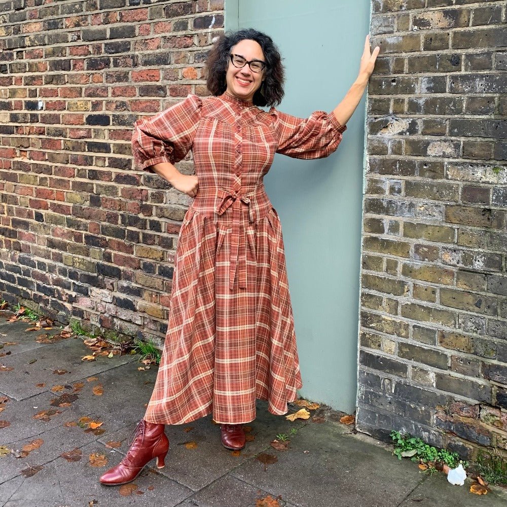 Vintage style dress with three quarter length sleeves, dropped waist and Grandpa collar in a rusty plaid- The Green Gables Dress by Emmy Design Sweden from Revival Retro London UK.